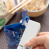 Machine électrique à sceller les sacs et sachets alimentaires rechargeable avec aimant et cutter intégrés - Livraison Offerte