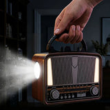 Radio FM/AM + enceinte Bluetooth style rétro avec éclairage LED et lumière torche intégrée - Livraison offerte
