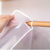Housse de protection anti-poussière pour vêtements suspendus - Livraison offerte